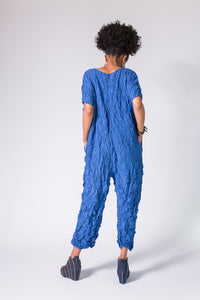 back of blue jumpsuit