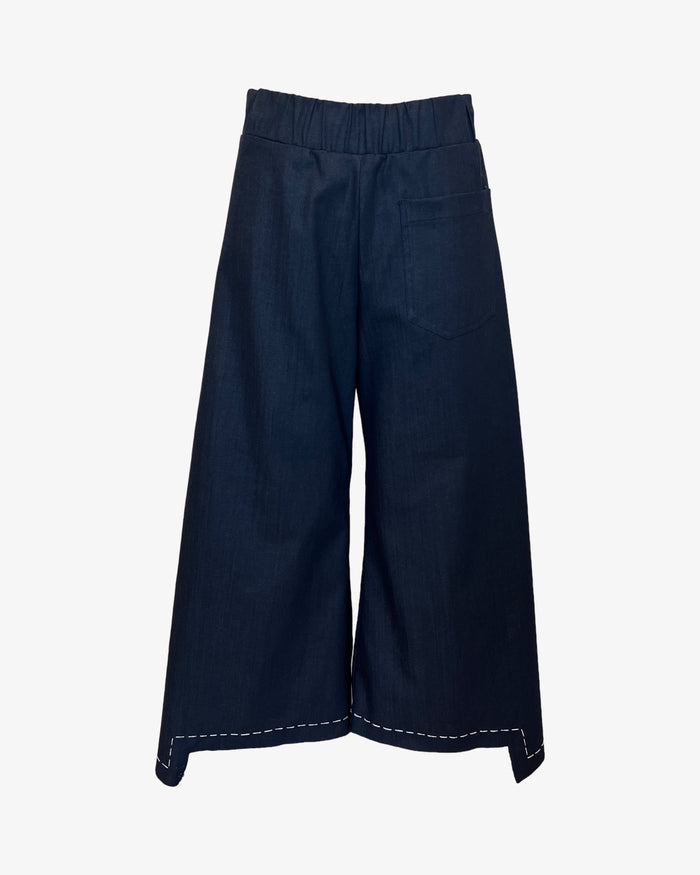 Wide-leg cutout hem jeans with hand stitch detail, raw hem, and patch pockets — lightweight stretch denim, made in Los Angeles by Carol Young Undesigned. Front product shot
