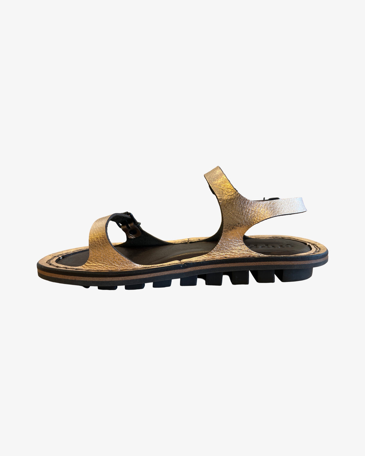 Trippen Slender copper metallic leather sandal with adjustable toe, instep, and heel buckle straps, two-tone footbed, and rubber sole, handmade in Germany. Side product shot