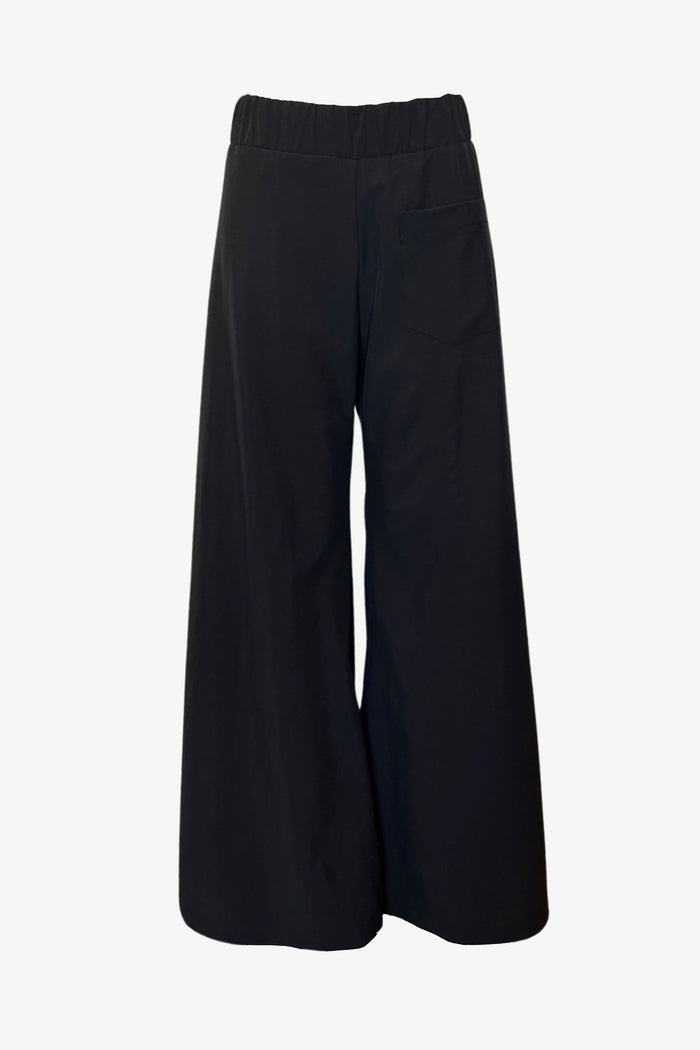 black techno Hepburn Trousers, artisan made designer fashion in Los Angeles. Flowy, comfortable, and timeless, wide-legged trousers. Front product shot