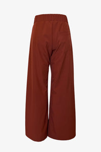 terracotta Hepburn Trousers, artisan made designer fashion in Los Angeles. Flowy, comfortable, and timeless, wide-legged trousers