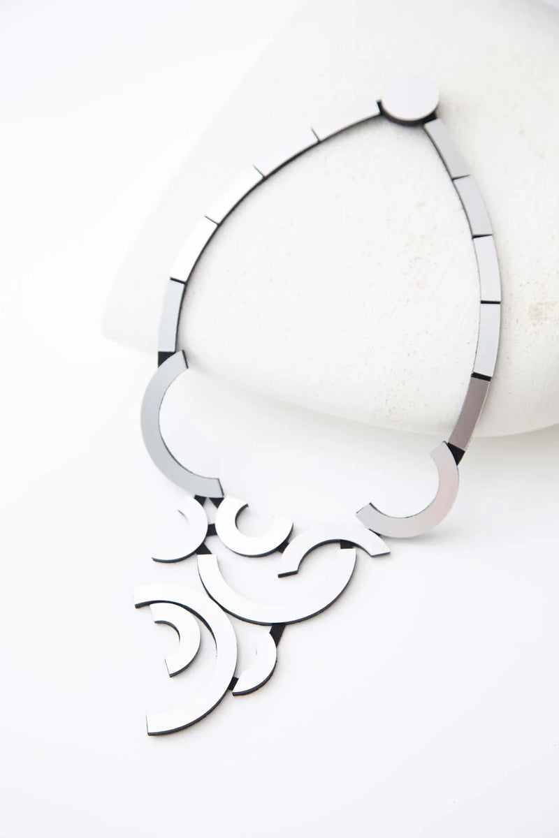 Clean lines, modern silhouettes, and a mirror finish come together to create pieces that elevate any look with subtlety and sophistication.